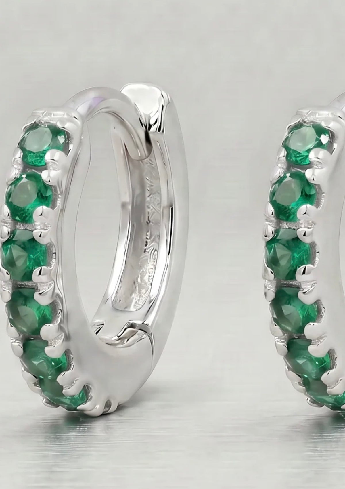 Pair of 925 sterling silver emerald green CZ huggie hoops