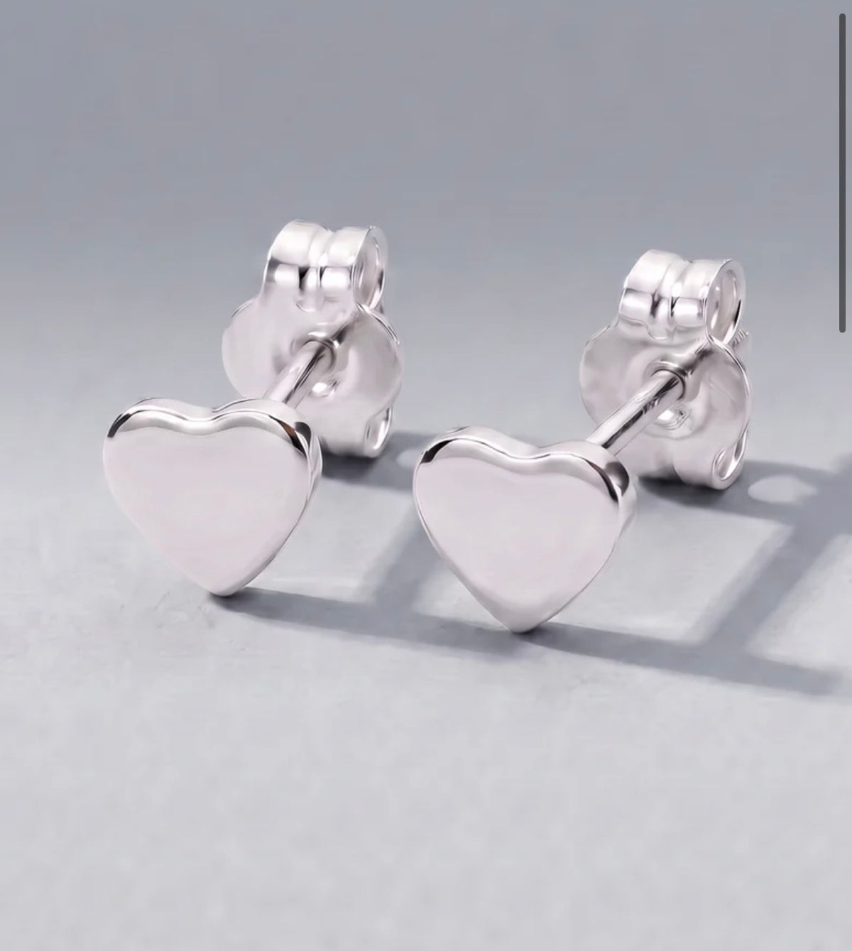 Sterling silver polished heart stud earrings pair