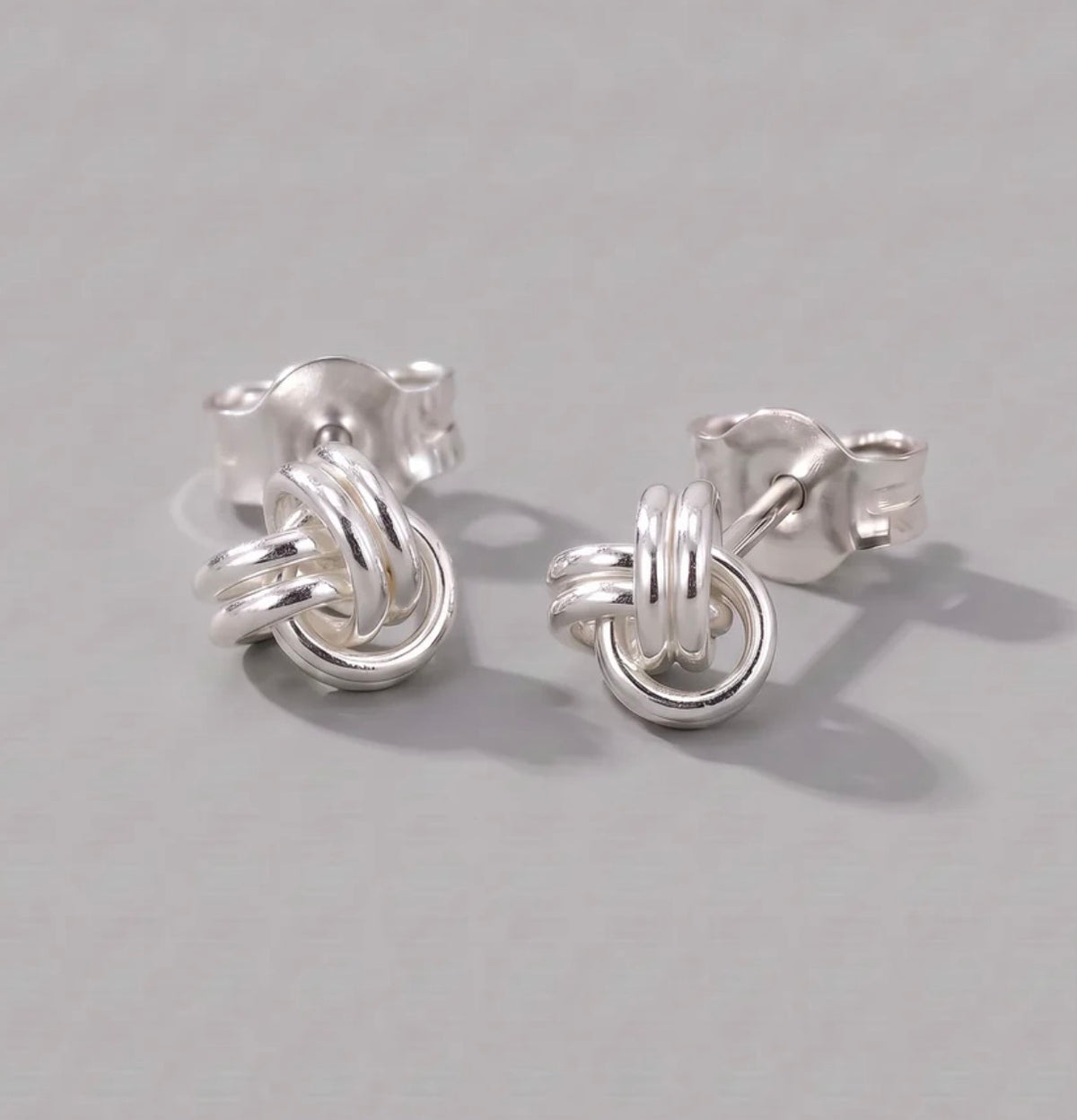 Sterling silver knot stud earrings detail view 1