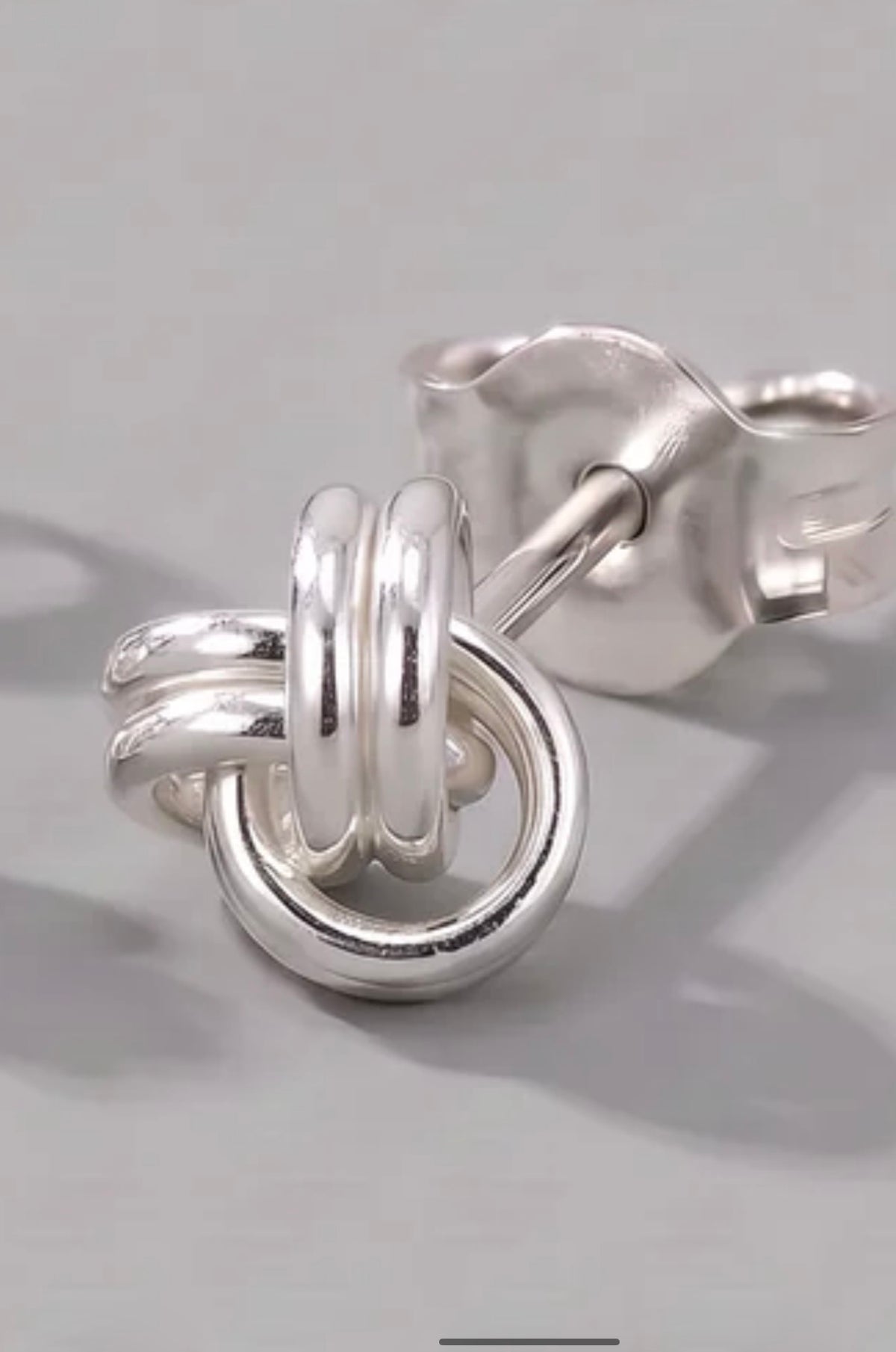 Sterling silver knot stud earrings detail view 2