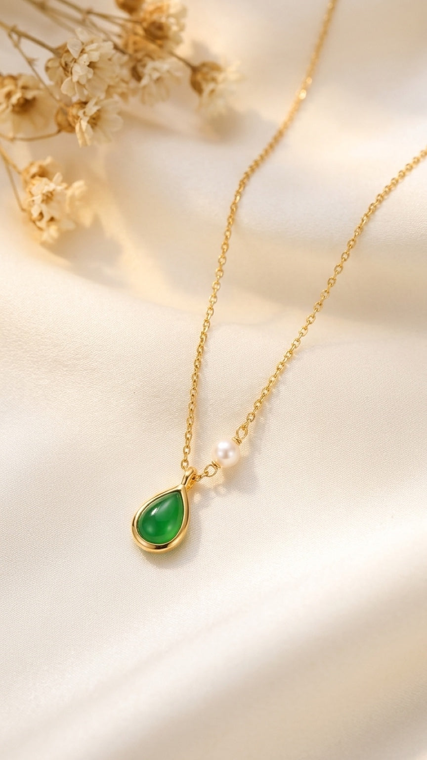 Green onyx and pearl gold-plated silver necklace on cream silk
